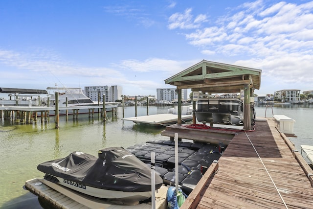 dock area featuring a water view