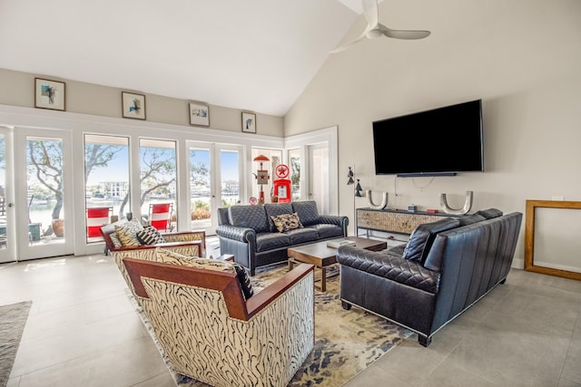 living room with high vaulted ceiling, french doors, and ceiling fan