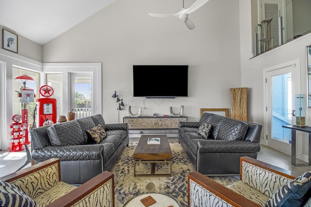 living room with high vaulted ceiling and ceiling fan