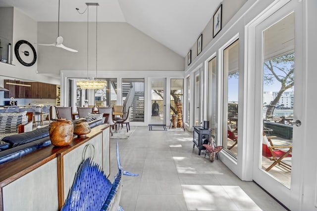 interior space with an inviting chandelier and vaulted ceiling