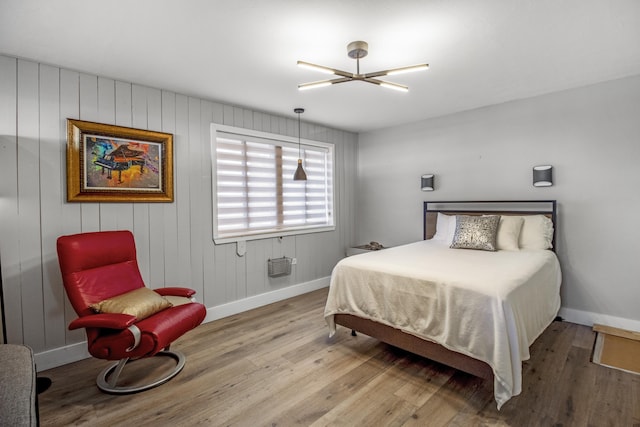 bedroom with light wood-type flooring