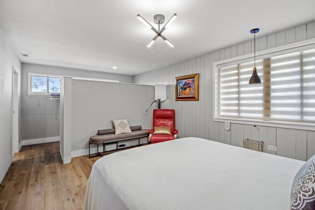 bedroom with light hardwood / wood-style floors