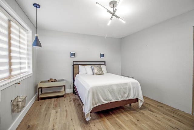 bedroom with light hardwood / wood-style flooring