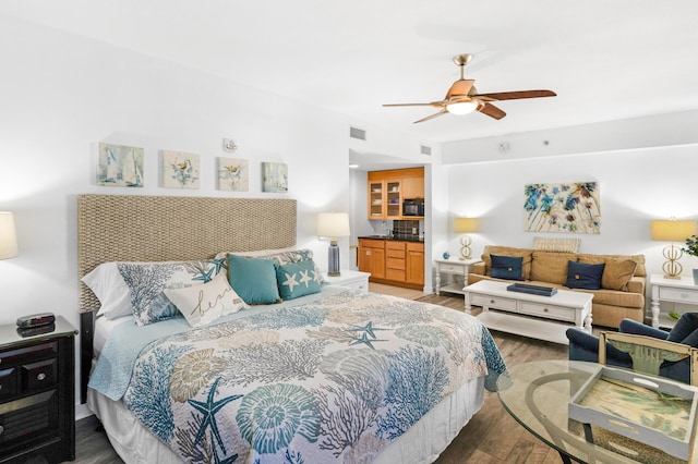 bedroom featuring hardwood / wood-style floors and ceiling fan