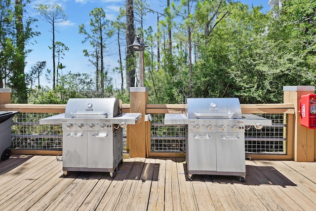 wooden deck featuring grilling area