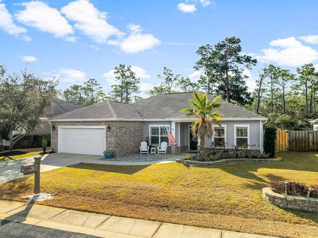 ranch-style home with a garage and a front lawn