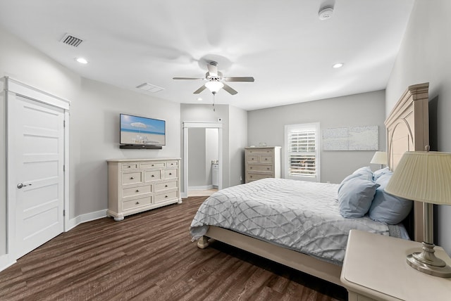 bedroom with ceiling fan and dark hardwood / wood-style flooring