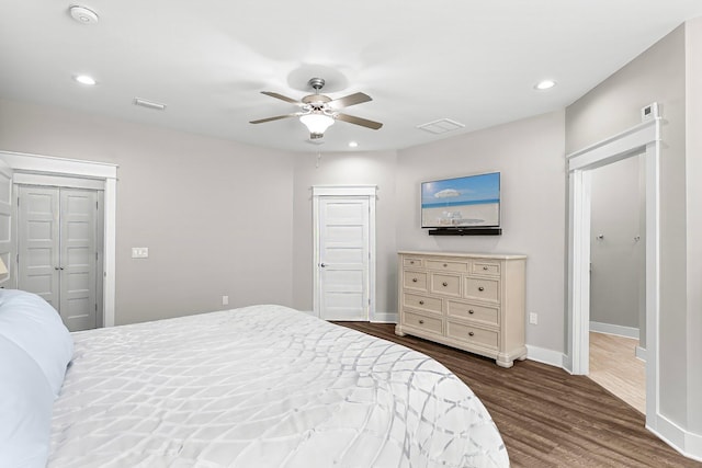 bedroom featuring dark wood-type flooring and ceiling fan