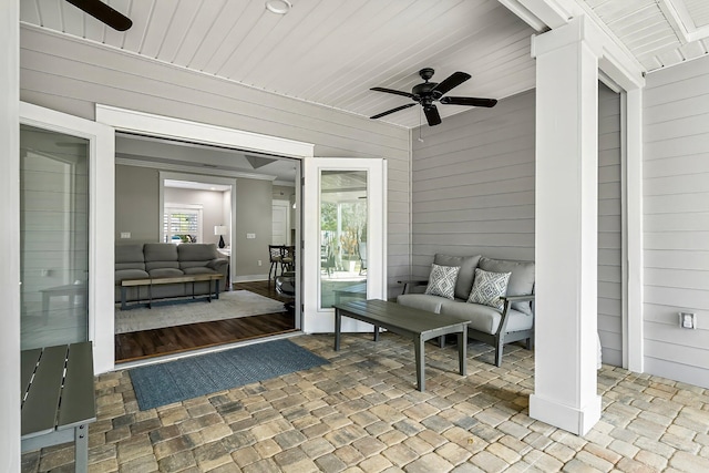 view of patio / terrace featuring ceiling fan