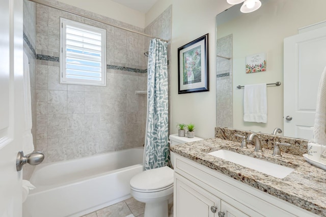 full bathroom featuring tile patterned floors, vanity, toilet, and shower / bath combo with shower curtain