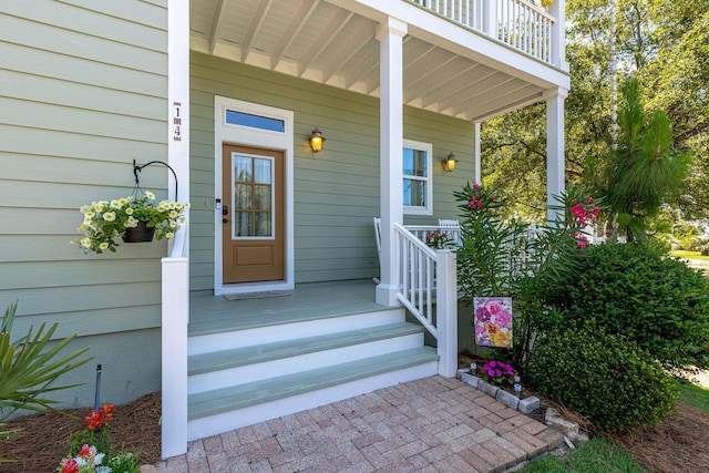 doorway to property with covered porch