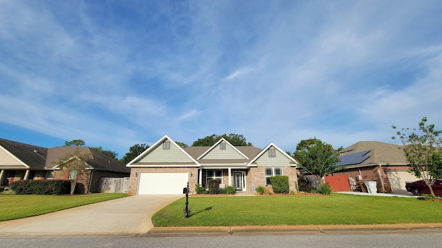 craftsman-style house with a garage and a front lawn