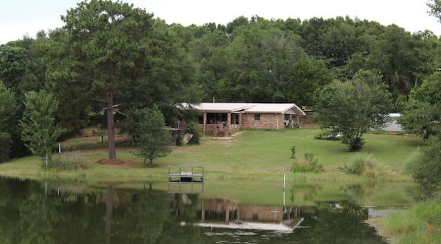 exterior space with a water view