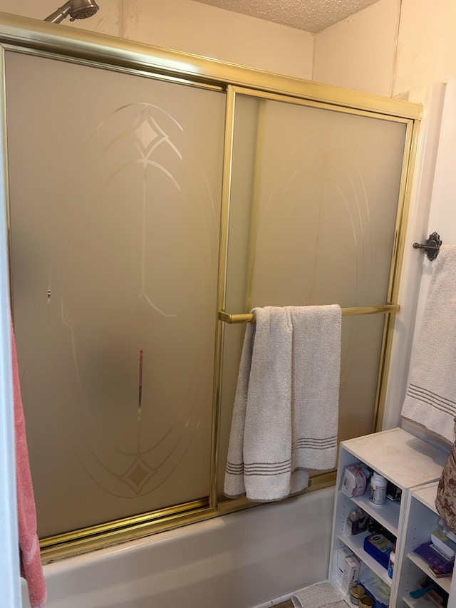 bathroom with a textured ceiling