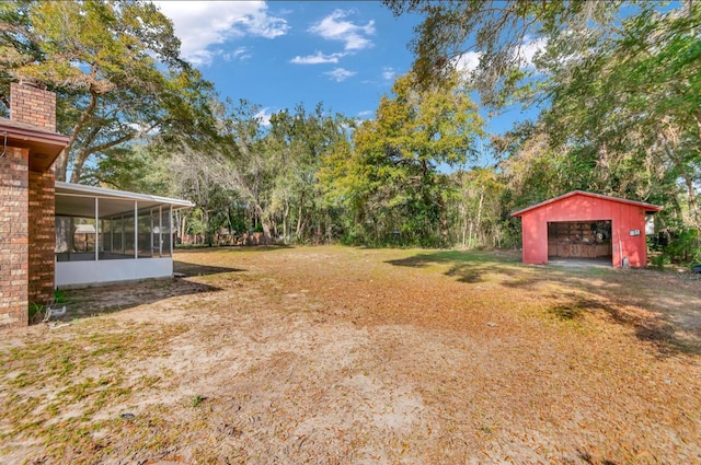 view of yard with a sunroom