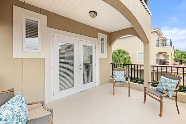 balcony featuring french doors