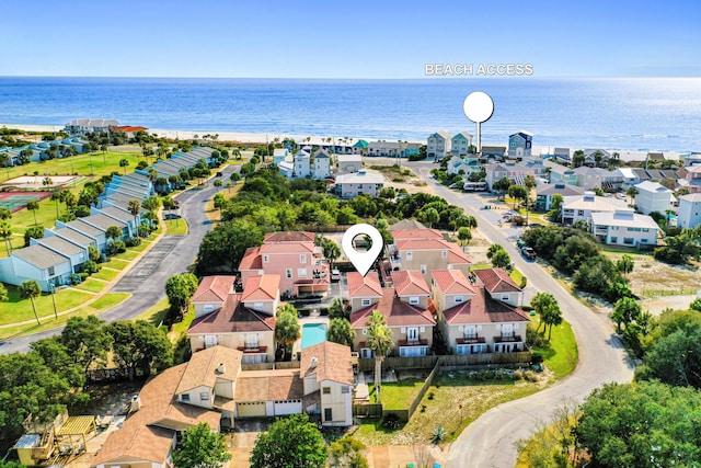 birds eye view of property featuring a water view and a residential view