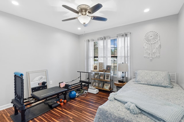 bedroom featuring ceiling fan and dark hardwood / wood-style flooring