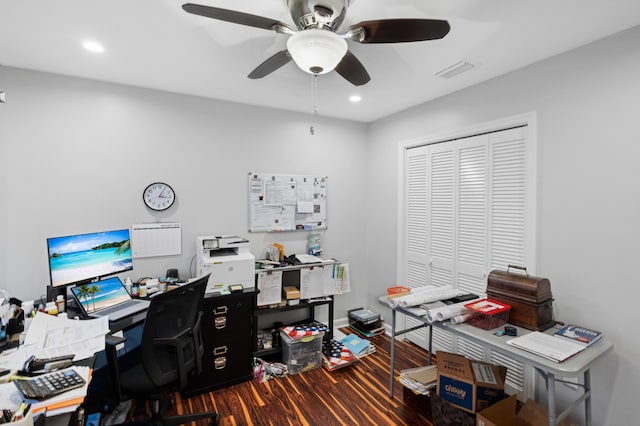 office with ceiling fan and dark hardwood / wood-style flooring