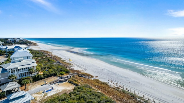 aerial view featuring a beach view and a water view