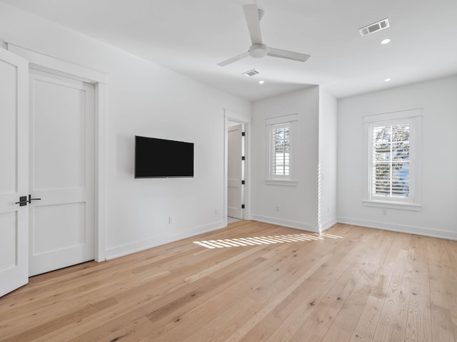 foyer featuring ceiling fan and light hardwood / wood-style flooring