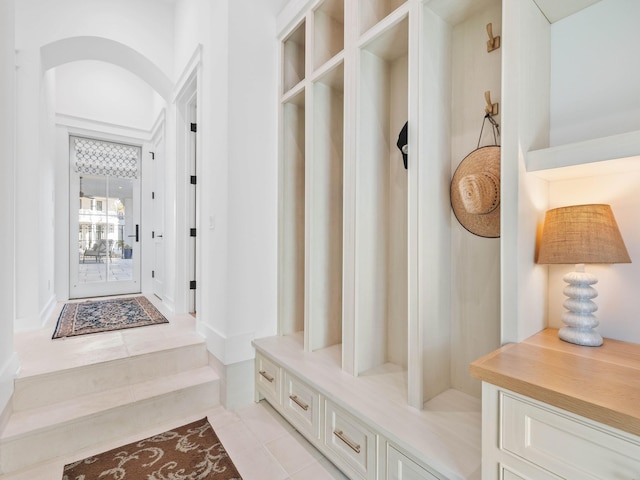 mudroom with light tile patterned floors