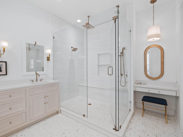 bathroom with vanity and an enclosed shower