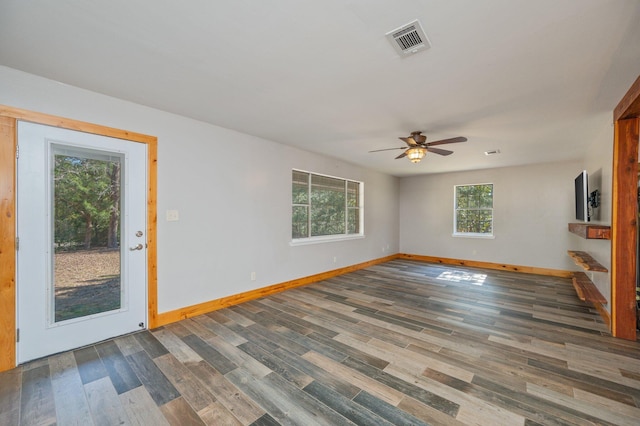 unfurnished room with ceiling fan and hardwood / wood-style floors