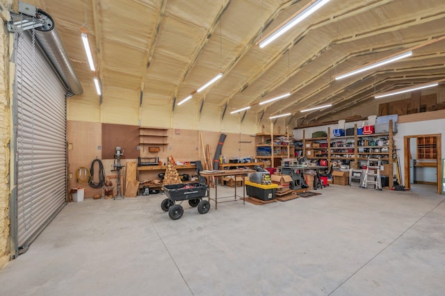 garage with a workshop area