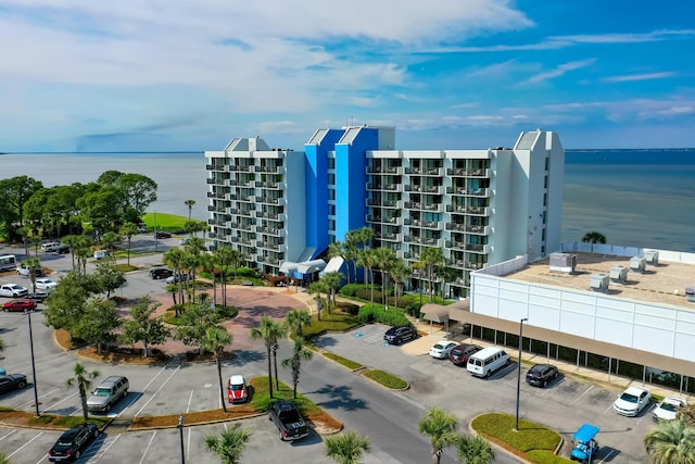 view of building exterior featuring a water view