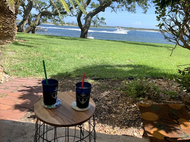 view of yard with a water view