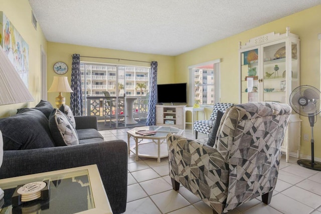 tiled living room with a textured ceiling