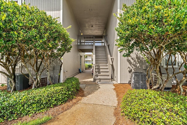 view of exterior entry with central AC unit