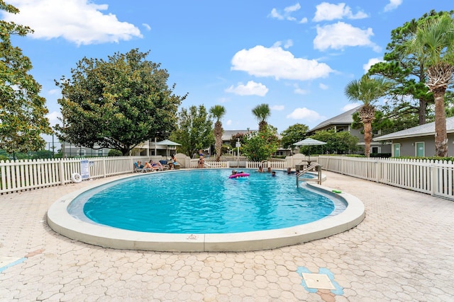 view of pool with a patio area