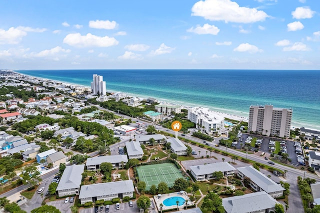 bird's eye view with a water view and a view of the beach