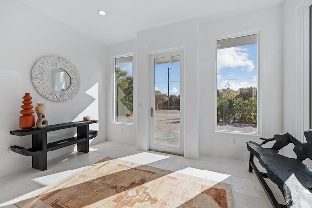 doorway featuring recessed lighting