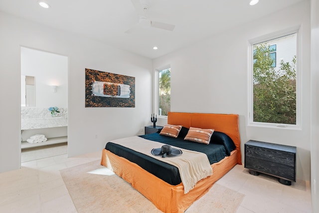 bedroom with ensuite bathroom, a ceiling fan, and recessed lighting