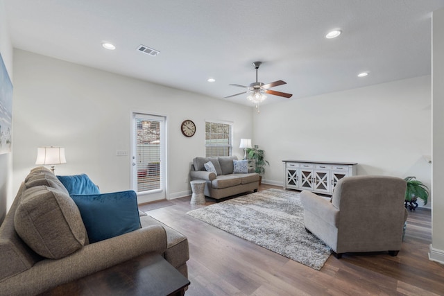 8872 White Ibis Way, Navarre, FL 32566 - living area featuring a ceiling fan, visible vents, wood finished floors, and recessed lighting
