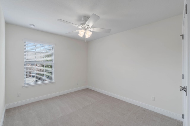 8872 White Ibis Way, Navarre, FL 32566 - unfurnished room with light colored carpet, a ceiling fan, and baseboards
