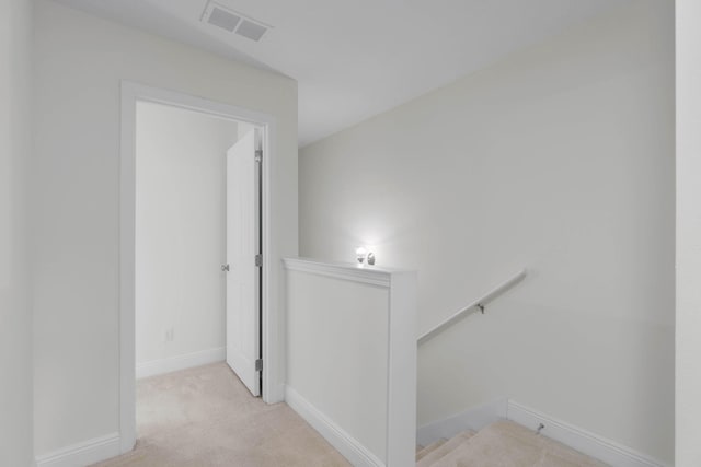 8872 White Ibis Way, Navarre, FL 32566 - stairway with carpet floors, baseboards, and visible vents