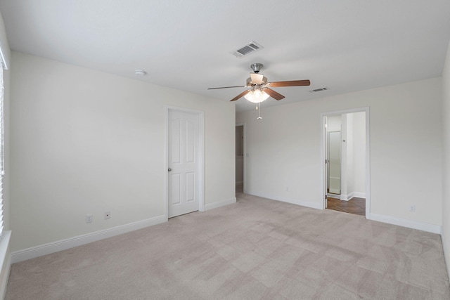 8872 White Ibis Way, Navarre, FL 32566 - unfurnished bedroom featuring carpet floors, baseboards, and visible vents