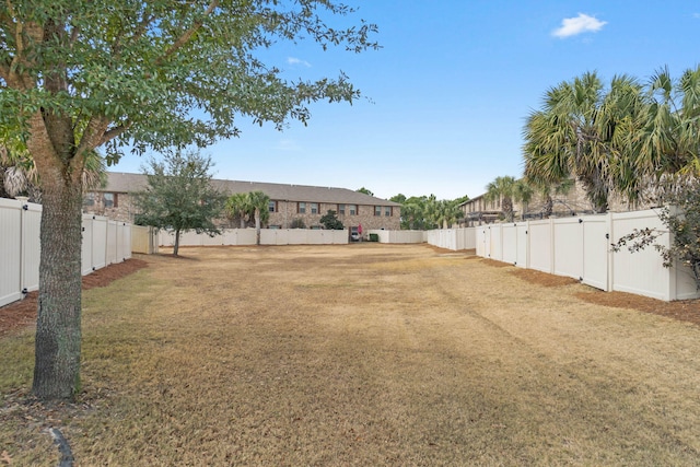 8872 White Ibis Way, Navarre, FL 32566 - view of yard featuring a fenced backyard