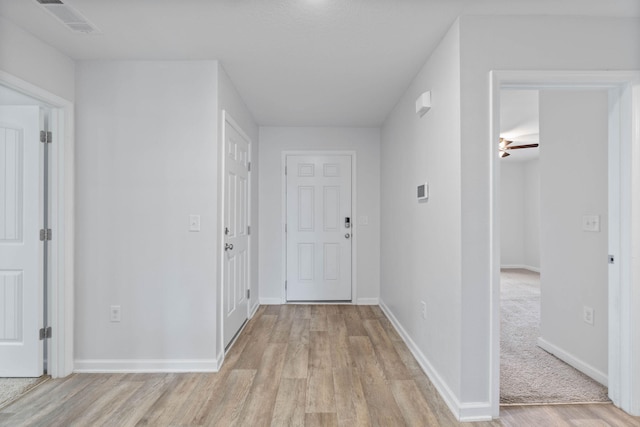 hall featuring light wood-type flooring