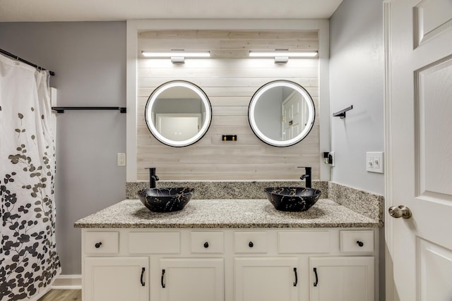 bathroom featuring vanity and a shower with curtain