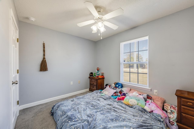 bedroom featuring ceiling fan and carpet flooring