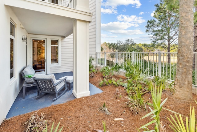 view of patio / terrace with a balcony