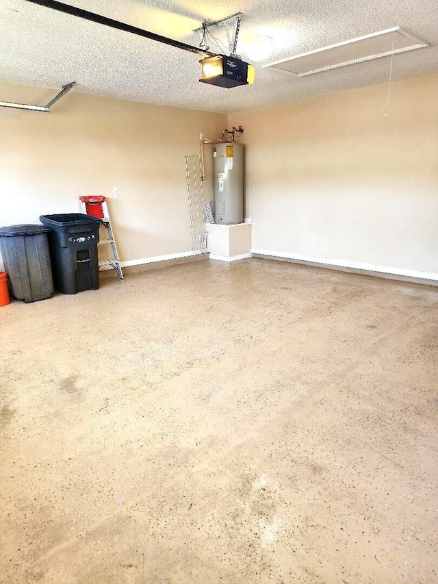 garage with a garage door opener and electric water heater