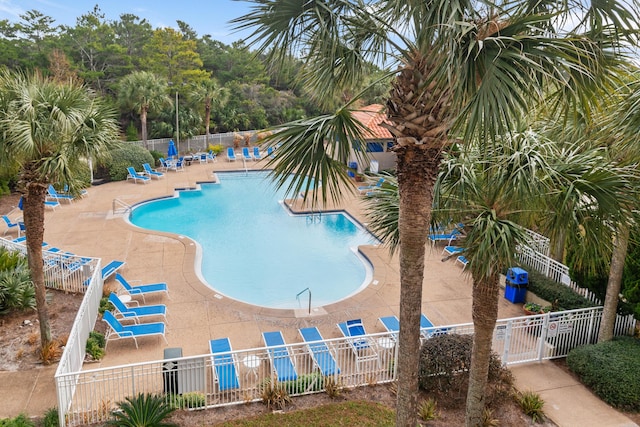 view of swimming pool with a patio