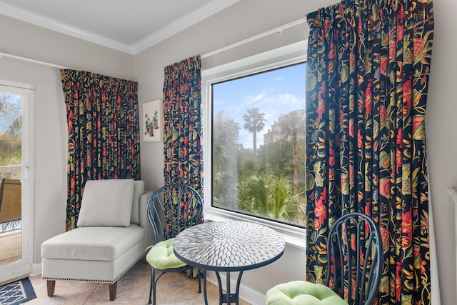 sitting room with ornamental molding