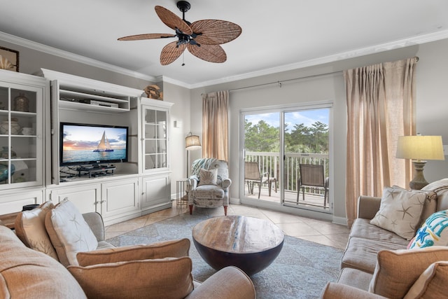 living room featuring light tile patterned flooring, ornamental molding, and ceiling fan